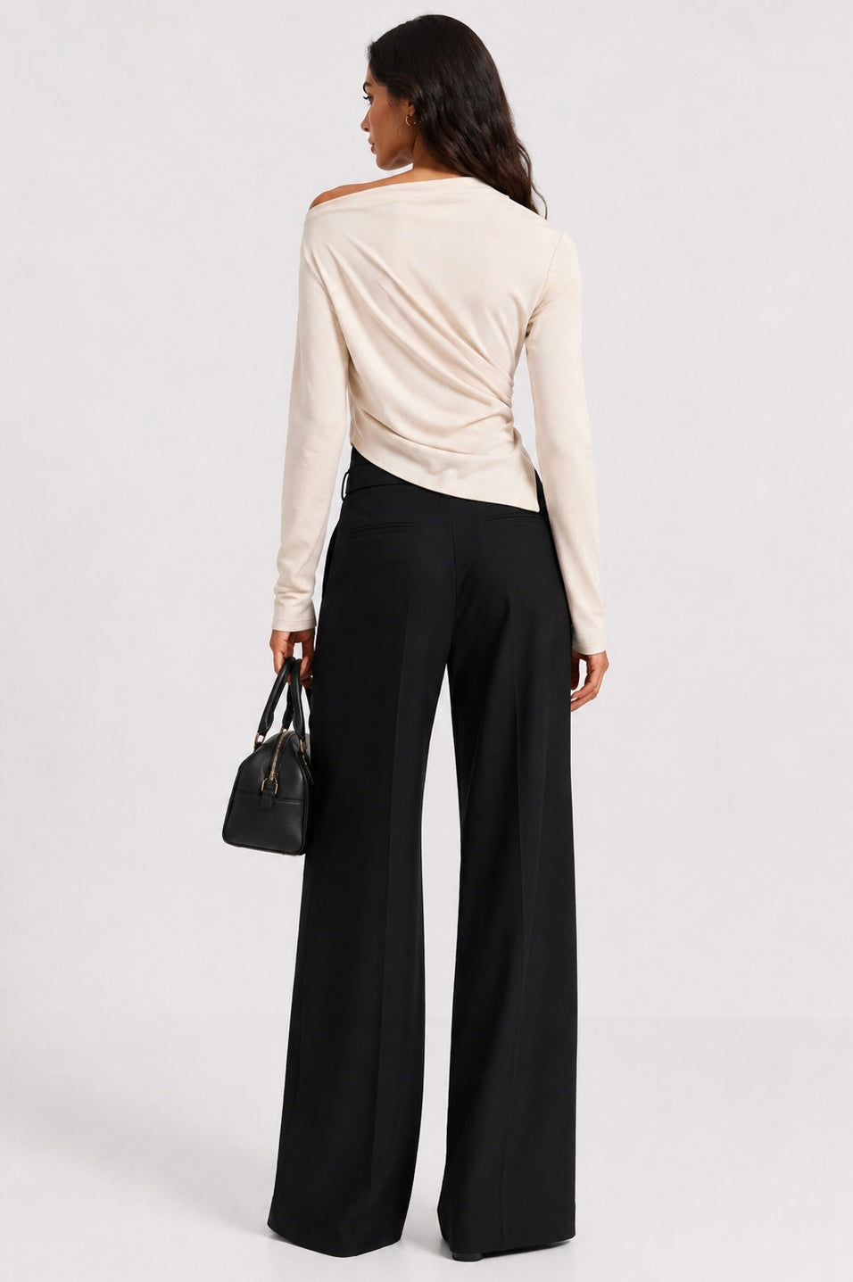 Noir Asymmetry Top