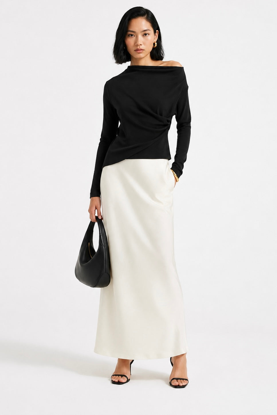 Noir Asymmetry Top