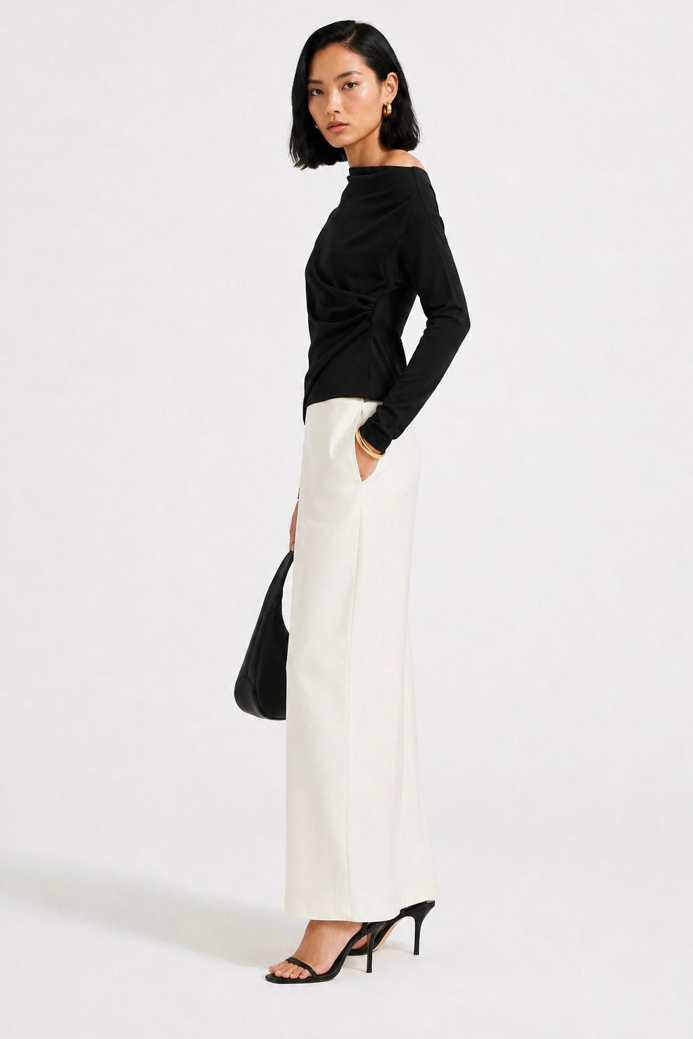 Noir Asymmetry Top