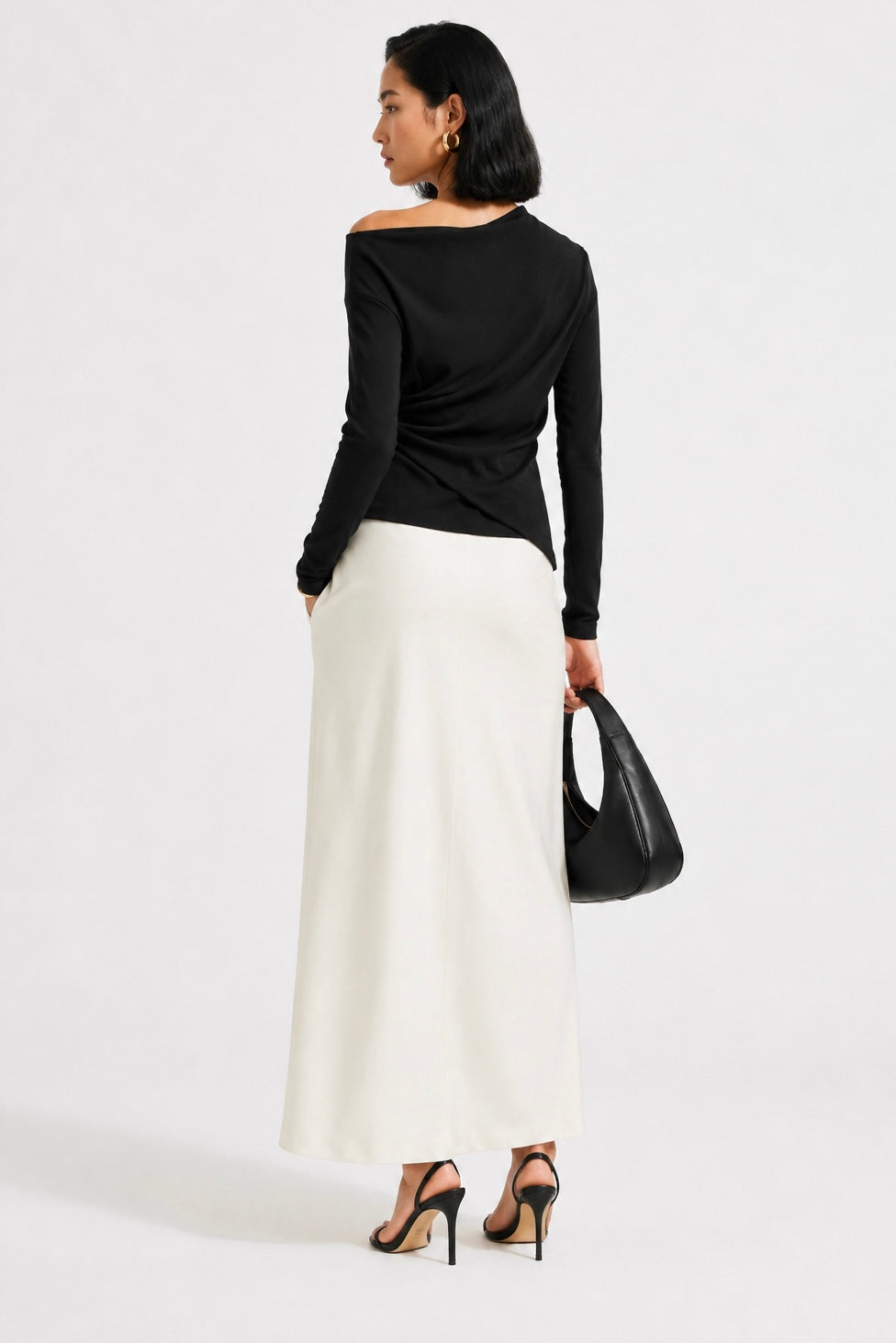 Noir Asymmetry Top